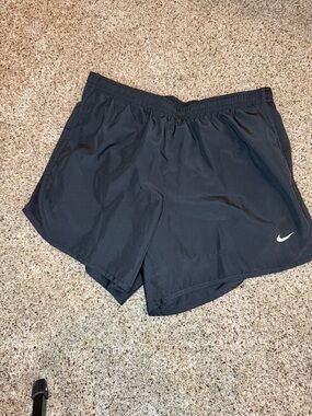 Nike Black Athletic Shorts with White Swoosh Accent